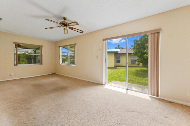 6472 Overland Dr, Delray Beach, FL 33484 - empty room featuring ceiling fan, baseboards, visible vents, and carpet floors
