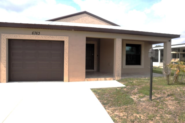 6763 Mar Pacifico, Fort Pierce, FL 34950 - view of front of house with driveway