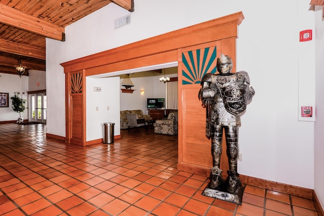 6763 Mar Pacifico, Fort Pierce, FL 34950 - interior space featuring tile patterned flooring, baseboards, wood ceiling, beam ceiling, and visible vents