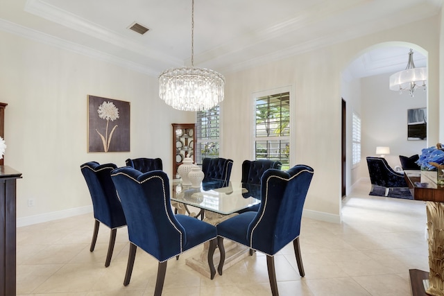 12479 Aviles Cir, Palm Beach Gardens, FL 33418 - dining space featuring a chandelier, arched walkways, light tile patterned floors, and ornamental molding