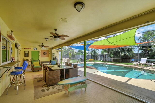 3412 Lake Osborne Dr, Lake Worth Beach, FL 33461 - view of patio with a ceiling fan, a lanai, and outdoor dining space