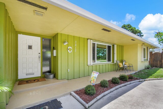 3412 Lake Osborne Dr, Lake Worth Beach, FL 33461 - kitchen featuring appliances with stainless steel finishes, gray cabinets, a kitchen breakfast bar, open floor plan, and recessed lighting