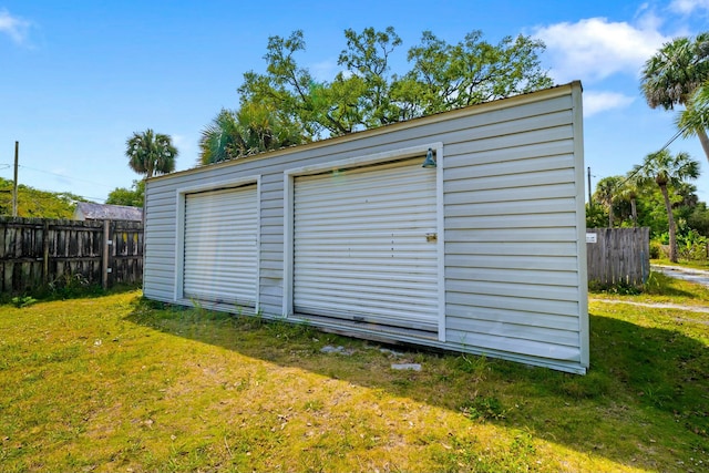 garage featuring fence