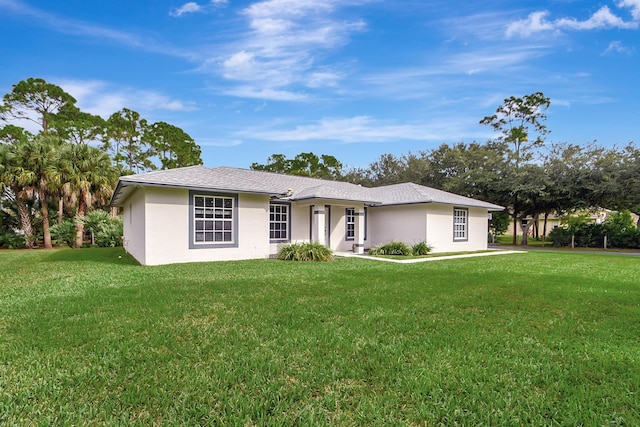 16181 90th St N, Loxahatchee, FL 33470 - single story home featuring stucco siding and a front lawn