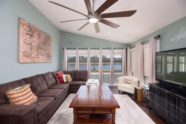 3381 SE E Snow Rd, Port Saint Lucie, FL 34984 - living room featuring lofted ceiling, wood finished floors, and a ceiling fan