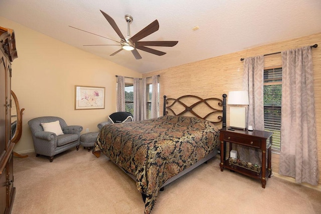 3381 SE E Snow Rd, Port Saint Lucie, FL 34984 - bedroom with a ceiling fan, light carpet, lofted ceiling, and a textured ceiling