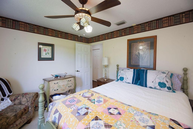 3381 SE E Snow Rd, Port Saint Lucie, FL 34984 - carpeted bedroom featuring visible vents and ceiling fan