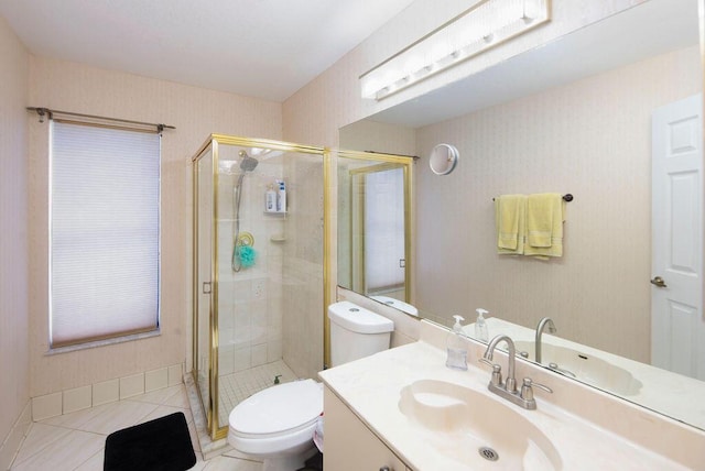 3381 SE E Snow Rd, Port Saint Lucie, FL 34984 - bathroom with vanity, toilet, and a shower stall