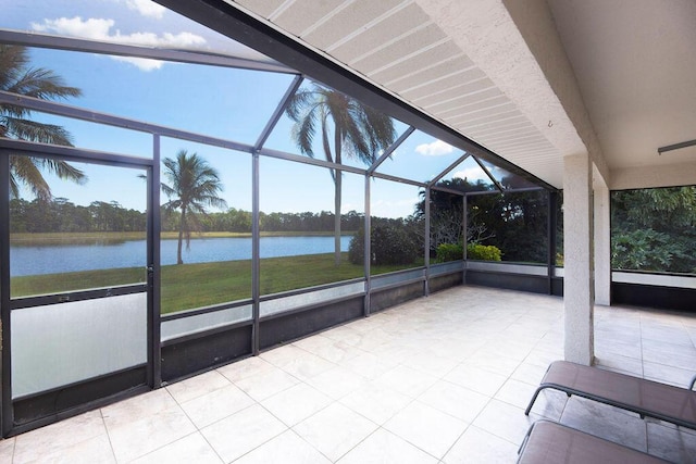 3381 SE E Snow Rd, Port Saint Lucie, FL 34984 - view of patio with a water view and a lanai