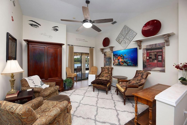 3381 SE E Snow Rd, Port Saint Lucie, FL 34984 - living area featuring a ceiling fan, wood finished floors, and visible vents