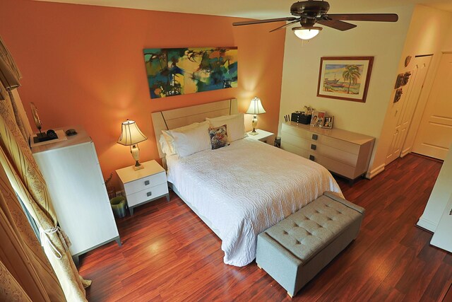bedroom featuring a ceiling fan and wood finished floors