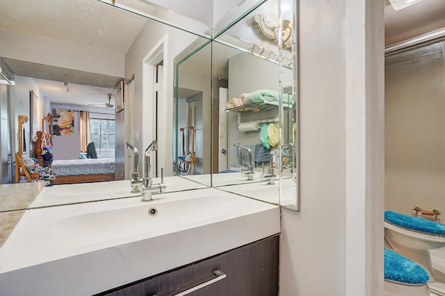 bathroom with ensuite bath and vanity