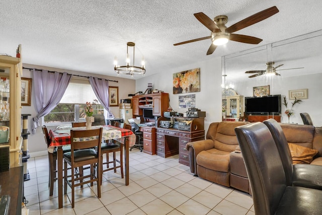 living area featuring ceiling fan, a chandelier, a textured ceiling, and light tile patterned floors
