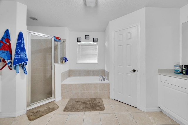 6116 NW Daroco Ter, Port Saint Lucie, FL 34986 - bathroom featuring a bath, a textured ceiling, tile patterned floors, and a shower stall