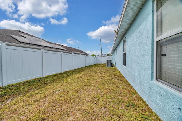 6116 NW Daroco Ter, Port Saint Lucie, FL 34986 - view of yard with a fenced backyard and central air condition unit