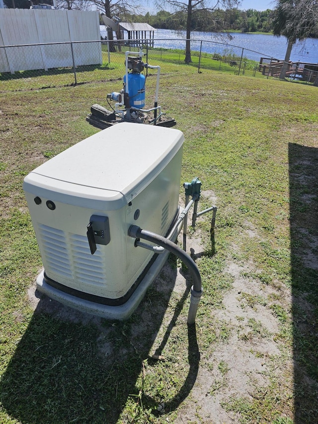exterior details featuring a power unit and fence