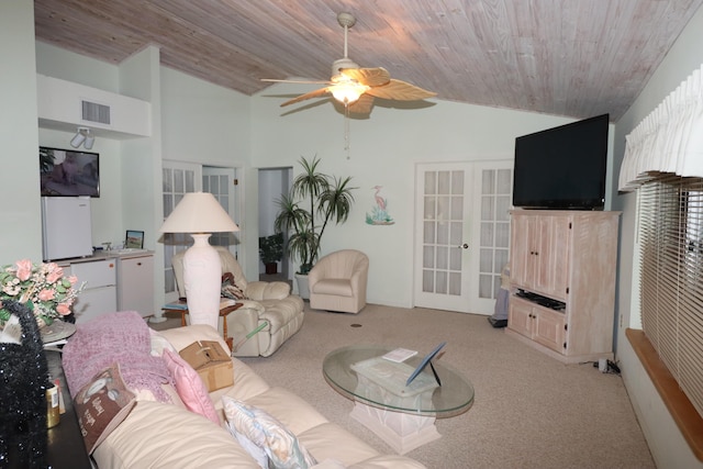 living room featuring vaulted ceiling, wood ceiling, light colored carpet, visible vents, and ceiling fan