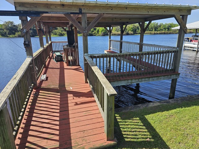 view of dock with a water view