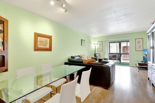 2050 NE 39th St Unit N313, Lighthouse Point, FL 33064 - living room featuring wood finished floors