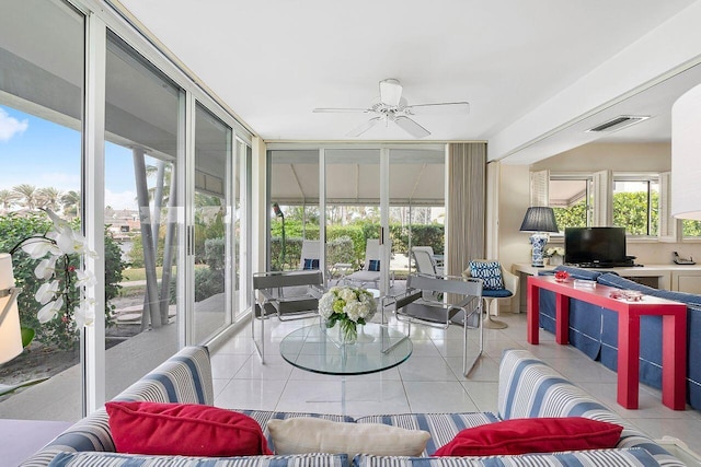 sunroom / solarium featuring visible vents