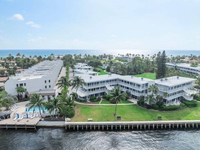 birds eye view of property featuring a water view