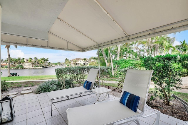 view of patio / terrace with a water view
