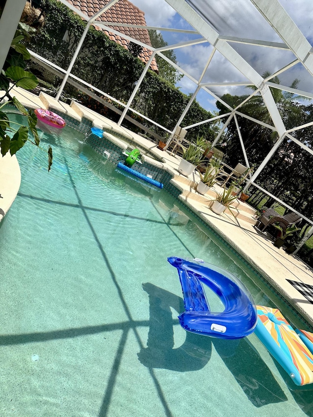 9494 Sun Pointe Dr, Boynton Beach, FL 33437 - outdoor pool featuring a lanai