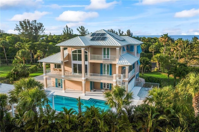 view of property with an outdoor pool