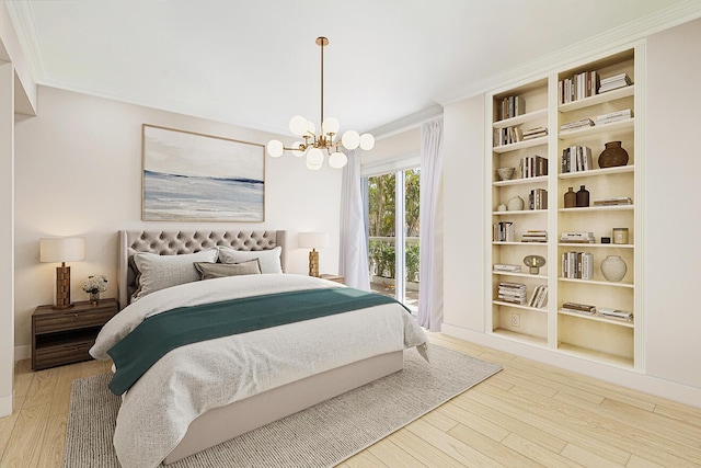 bedroom featuring wood finished floors, a chandelier, and ornamental molding