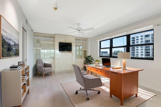 4605 S Ocean Blvd Unit 4C, Highland Beach, FL 33487 - office area featuring light wood-style floors and ceiling fan