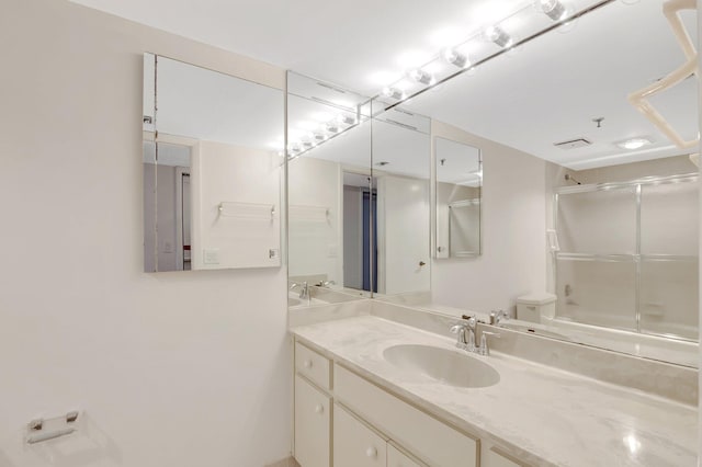 4605 S Ocean Blvd Unit 4C, Highland Beach, FL 33487 - bathroom featuring vanity and enclosed tub / shower combo