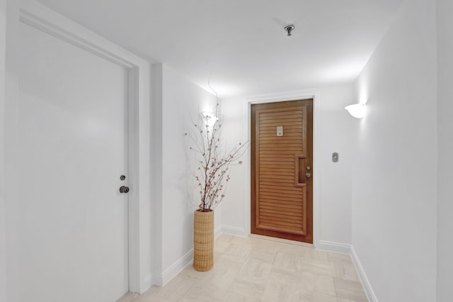 4605 S Ocean Blvd Unit 4C, Highland Beach, FL 33487 - corridor with baseboards