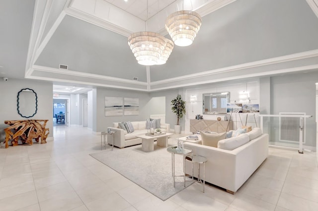 4605 S Ocean Blvd Unit 4C, Highland Beach, FL 33487 - living room featuring a tray ceiling, light tile patterned floors, a towering ceiling, crown molding, and a chandelier