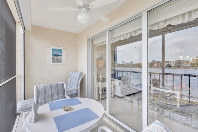 4468 NE Ocean Blvd Unit G2, Jensen Beach, FL 34957 - balcony with a ceiling fan, a water view, and outdoor dining space