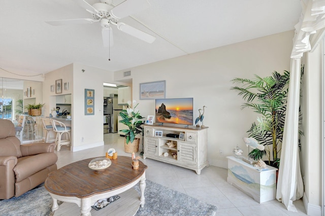 4468 NE Ocean Blvd Unit G2, Jensen Beach, FL 34957 - living room with a ceiling fan, light tile patterned floors, and baseboards