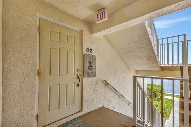 4468 NE Ocean Blvd Unit G2, Jensen Beach, FL 34957 - entrance to property featuring stucco siding