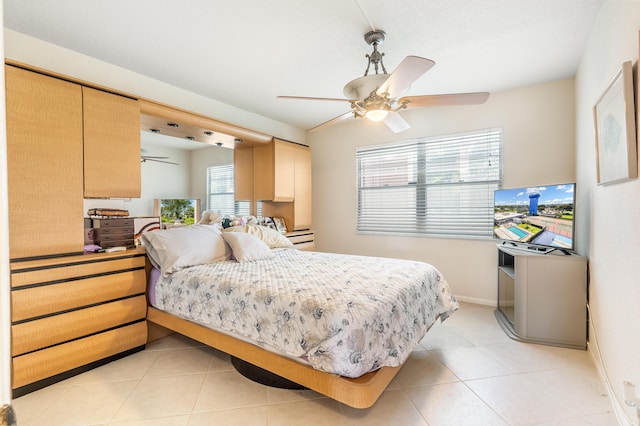 325 Tilford P, Deerfield Beach, FL 33442 - bedroom featuring baseboards, ceiling fan, and light tile patterned floors