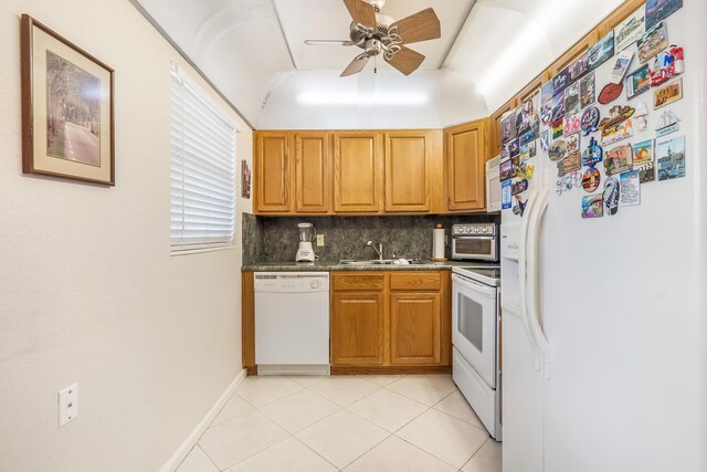 325 Tilford P, Deerfield Beach, FL 33442 - kitchen with white appliances, ceiling fan, dark countertops, tasteful backsplash, and a sink