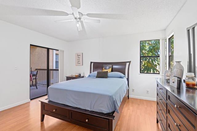 5661 Riverside Dr Unit 206B7, Coral Springs, FL 33067 - bedroom with access to exterior, light wood finished floors, baseboards, a textured ceiling, and ceiling fan