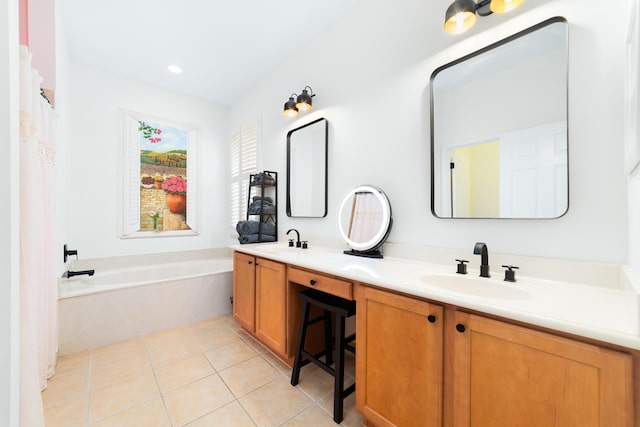 full bathroom with double vanity, a sink, a garden tub, and tile patterned flooring