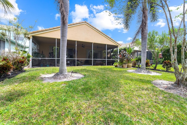 view of yard with a sunroom
