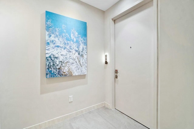 foyer with baseboards