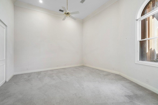 spare room featuring crown molding, baseboards, light colored carpet, ceiling fan, and recessed lighting