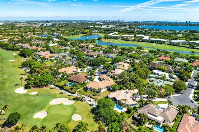 bird's eye view featuring view of golf course, a residential view, and a water view