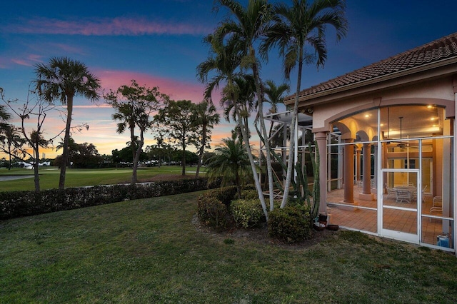 view of yard with a lanai