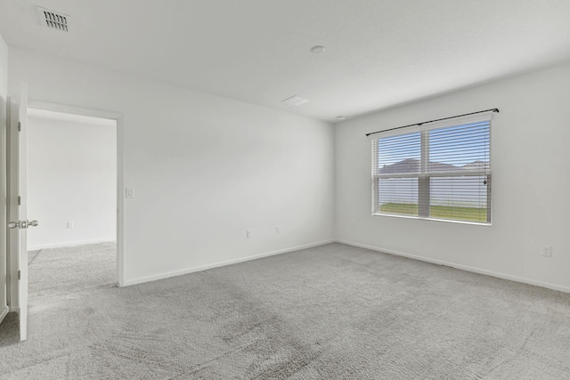 11265 SW Hadley St, Port Saint Lucie, FL 34987 - carpeted empty room with visible vents and baseboards