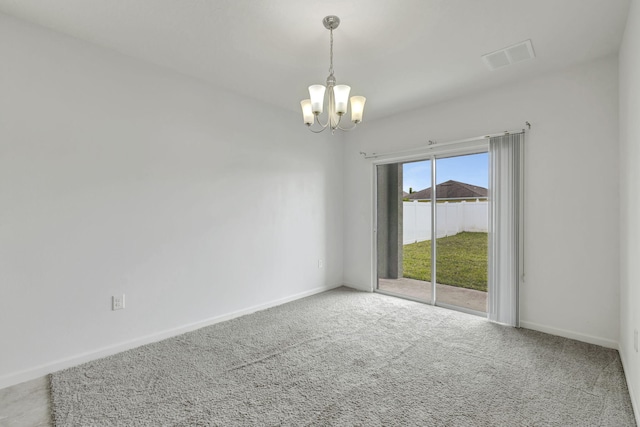 11265 SW Hadley St, Port Saint Lucie, FL 34987 - carpeted spare room with visible vents, baseboards, and a notable chandelier