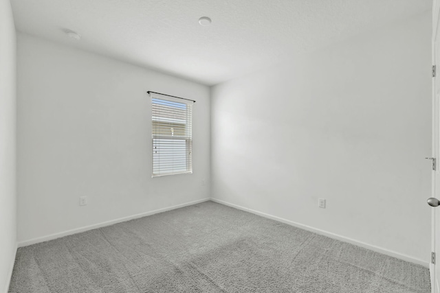 11265 SW Hadley St, Port Saint Lucie, FL 34987 - unfurnished room with carpet floors and baseboards