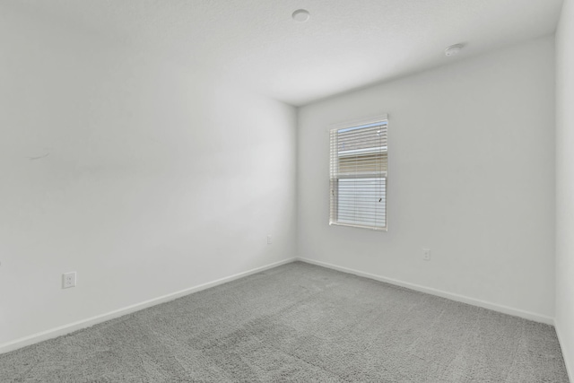 11265 SW Hadley St, Port Saint Lucie, FL 34987 - unfurnished room featuring carpet floors and baseboards