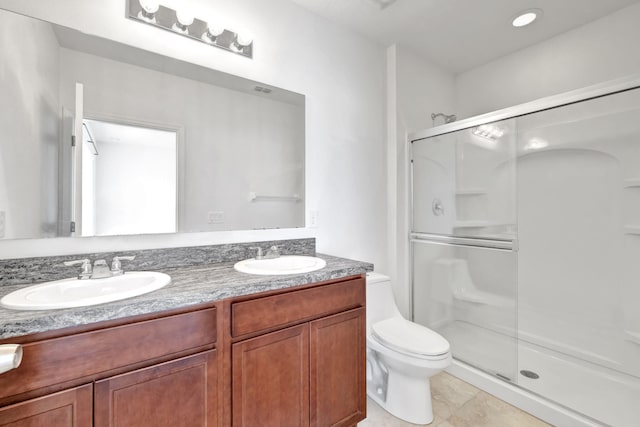 11265 SW Hadley St, Port Saint Lucie, FL 34987 - bathroom with toilet, a sink, double vanity, and a stall shower